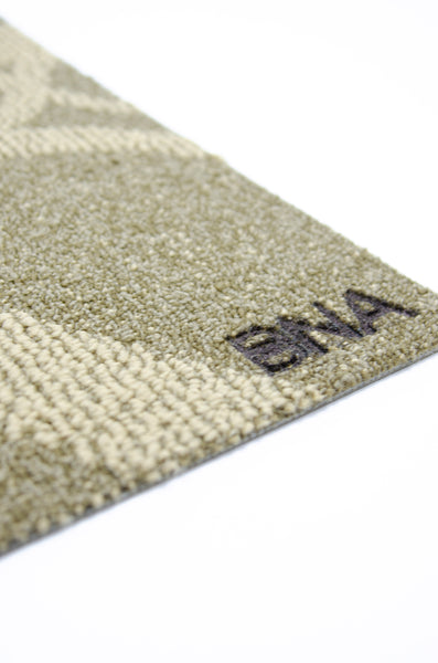 Detail of Brand on BNA Carpet Doormat