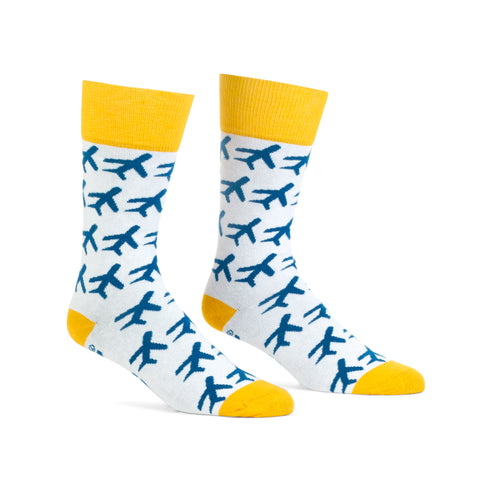 White socks with blue allover airplane pattern and gold cuffs, heel, and toe.