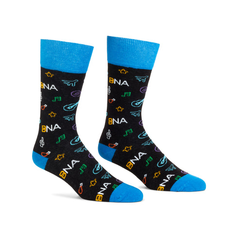 Black cuffs with BNA & Nashville pattern allover design.  Bright blue cuffs, heels, and toes.  Pattern features planes, BNA logo, music notes, hot chicken, stars, and guitars.