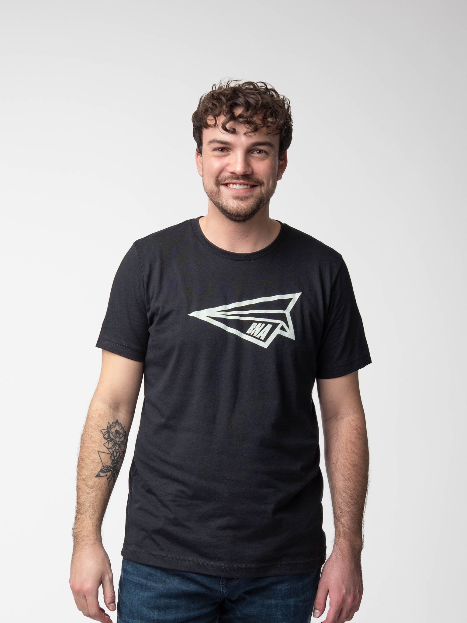 Man wearing Paper Airplane Black T-Shirt