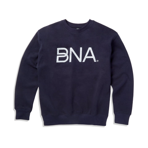 Unisex crewneck sweatshirt in navy blue featuring distressed white BNA logo on center of chest.