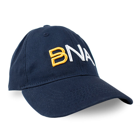 side view of front of hat.  Navy blue ballcap with BNA logo in 3D embroidery.  B is gold and NA is white.