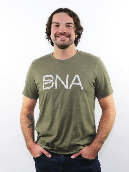 Male model wearing Heather Olive BNA Logo Tee.